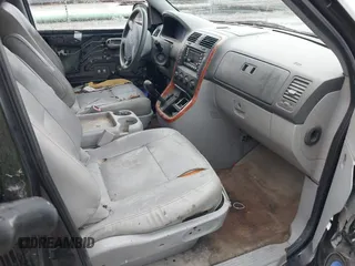 2005 Kia Sedona LX with VIN KNDUP132356703354, listed as a IAAI auction lot 41529197 with 1 mi miles. Bid and sale history available at carsss.com. Image 5.