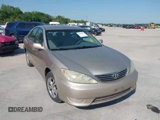 2006 Toyota Camry STD with VIN 4T1BE30K76U704819, listed as a IAAI auction lot 42021982 with 264,934 mi miles and . Bid and sale history available at carsss.com. Image 1.
