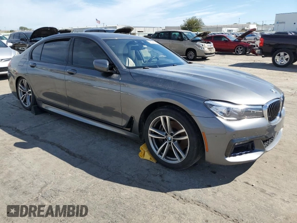 2018 BMW 7 Series 740e xDrive iPerformance with VIN WBA7J2C54JG938233, listed as a Copart auction lot 72694354 with 83,122 mi miles and Salvage Title. Bid and sale history available at carsss.com. Image 4.