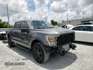 2021 Ford F-150 XL with VIN 1FTFW1E87MFC00633, listed as a Copart auction lot 65318235 with 91,264 mi miles and Salvage title. Bid and sale history available at DreamBid. Image 14.