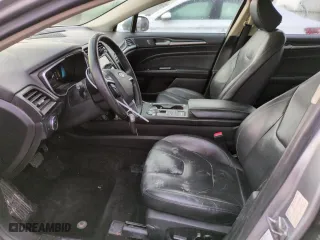 2020 Ford Fusion Hybrid Titanium with VIN 3FA6P0RU5LR100360, listed as a Copart auction lot 51325575 with 77,217 mi miles and Salvage Title. Bid and sale history available at carsss.com. Image 7.
