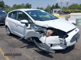 2018 Ford Fiesta SE z VIN 3FADP4EJ8JM141067, wystawiony jako IAAI lot #42417301 z przebiegiem 71 150 mil mil oraz . Historia ofert i sprzedaży dostępna na DreamBid. Obrazek 6.