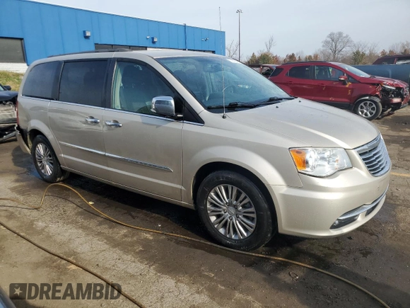 2015 Chrysler Town & Country Touring L with VIN 2C4RC1CG0FR513812, listed as a Copart auction lot 77467854 with 157,196 mi miles and Clean Title. Bid and sale history available at DreamBid. Image 4.