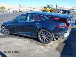 2014 Tesla Model S 60 with VIN 5YJSA1H14EFP57209, listed as a IAAI auction lot 41305157 with 141,364 mi miles and . Bid and sale history available at DreamBid. Image 21.