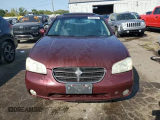 2001 Nissan Maxima SE 20th Anniversary. z VIN JN1CA31A31T314926, wystawiony jako Copart lot #69869354 z przebiegiem Nie podano mil oraz Szkoda całkowita • Salvage title. Historia ofert i sprzedaży dostępna na DreamBid. Obrazek 5.