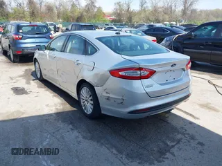 2016 Ford Fusion Energi SE Luxury with VIN 3FA6P0PU8GR273122, listed as a IAAI auction lot 42062083 with 166,318 mi miles. Bid and sale history available at carsss.com. Image 3.
