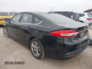 2018 Ford Fusion Hybrid S with VIN 3FA6P0UU9JR100852, listed as a IAAI auction lot 41516157 with 63,458 mi miles. Bid and sale history available at carsss.com. Image 3.