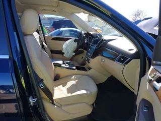 2016 Mercedes-Benz GLE with VIN 4JGDA5HB0GA719802, listed as a IAAI auction lot 41595294 with 112,527 mi miles. Bid and sale history available at carsss.com. Image 5.