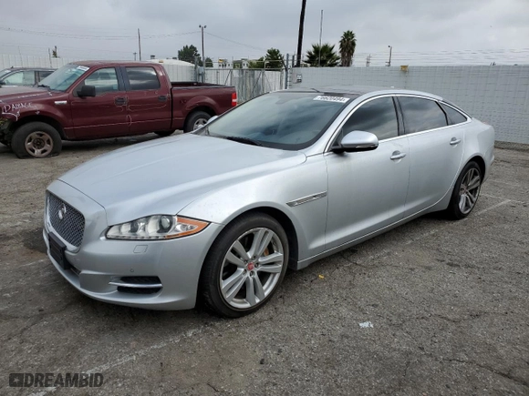 2014 Jaguar XJ with VIN SAJWJ2GD2E8V62696, listed as a Copart auction lot 76620494 with 85,487 mi miles and Salvage Title. Bid and sale history available at carsss.com. Image 1.