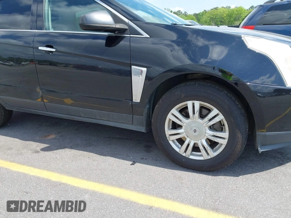 2014 Cadillac SRX with VIN 3GYFNAE30ES641616, listed as a IAAI auction lot 42000120 with 145,000 mi miles and . Bid and sale history available at DreamBid. Image 15.