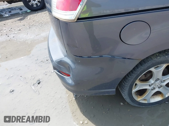 2010 Mazda 5 Sport with VIN JM1CR2W31A0375560, listed as a IAAI auction lot 42618380 with 171,910 mi miles and . Bid and sale history available at DreamBid. Image 13.