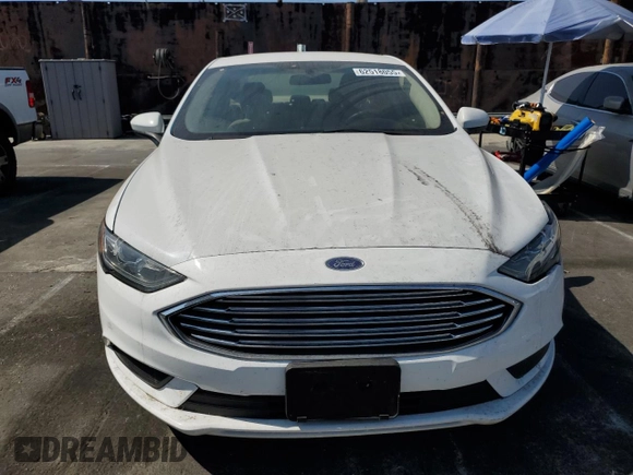 2017 Ford Fusion Hybrid SE z VIN 3FA6P0LU2HR209228, wystawiony jako Copart lot #62518055 z przebiegiem 119 174 mil mil oraz Szkoda całkowita • Salvage title. Historia ofert i sprzedaży dostępna na DreamBid. Obrazek 5.