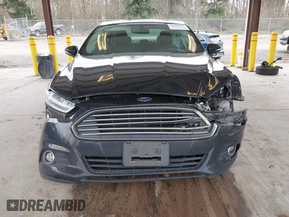 2016 Ford Fusion SE Hybrid with VIN 3FA6P0LU1GR106980, listed as a IAAI auction lot 41895379 with 200,226 mi miles. Bid and sale history available at carsss.com. Image 6.