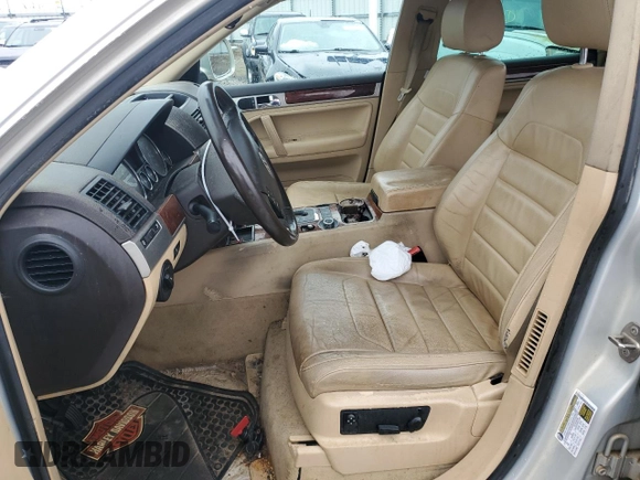 2010 Volkswagen Touareg VR6 with VIN WVGBF7A9XAD002471, listed as a Copart auction lot 83592274 with 202,497 mi miles and Salvage Title. Bid and sale history available at DreamBid. Image 7.