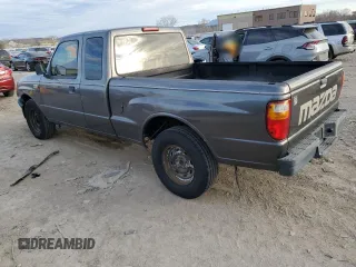 2005 Mazda B-Series 2WD Truck with VIN 4F4YR46U55PM01611, listed as a Copart auction lot 82660254 with 129,818 mi miles and Salvage Title. Bid and sale history available at carsss.com. Image 2.