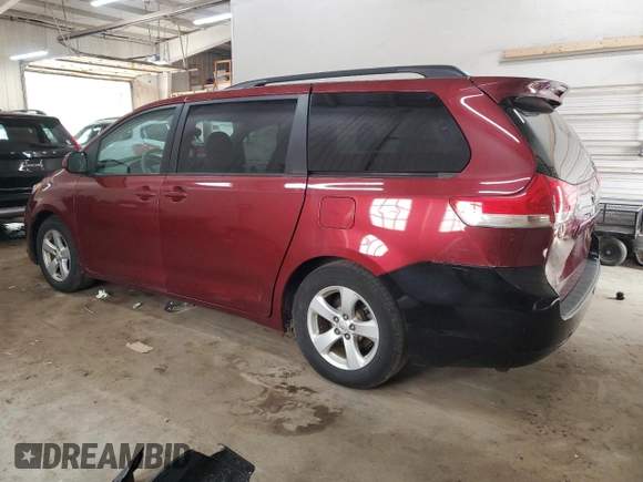 2011 Toyota Sienna LE AAS with VIN 5TDKK3DC4BS127181, listed as a Copart auction lot 59015195 with 170,677 mi miles and Salvage title. Bid and sale history available at DreamBid. Image 2.