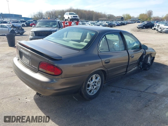 2000 Oldsmobile Intrigue GX z VIN 1G3WH52H0YF280823, wystawiony jako IAAI lot #42199925 z przebiegiem 102 427 mil mil oraz . Historia ofert i sprzedaży dostępna na DreamBid. Obrazek 4.
