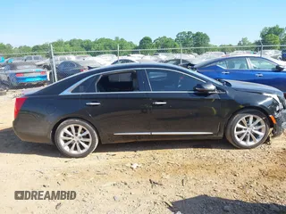 2014 Cadillac XTS Luxury z VIN 2G61M5S30E9229758, wystawiony jako IAAI lot #42179952 z przebiegiem 125 848 mil mil oraz . Historia ofert i sprzedaży dostępna na DreamBid. Obrazek 13.
