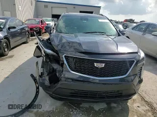 2022 Cadillac XT4 FWD Sport with VIN 1GYFZER46NF119009, listed as a Copart auction lot 57651725 with 37,896 mi miles and Salvage title. Bid and sale history available at DreamBid. Image 14.