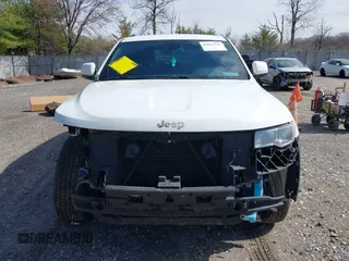 2018 Jeep Grand Cherokee Laredo E with VIN 1C4RJEAG3JC300760, listed as a IAAI auction lot 41811734 with 131,406 mi miles. Bid and sale history available at carsss.com. Image 12.