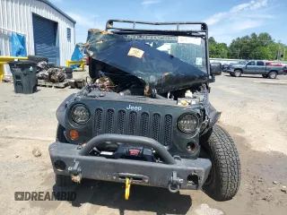 2011 Jeep Wrangler Unlimited Rubicon with VIN 1J4BA6H17BL571194, listed as a Copart auction lot 55430315 with Not provided miles and Salvage title. Bid and sale history available at DreamBid. Image 5.