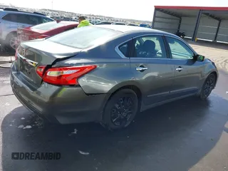 2016 Nissan Altima SV with VIN 1N4AL3AP5GC166005, listed as a IAAI auction lot 41795548 with 111,942 mi miles and . Bid and sale history available at DreamBid. Image 4.