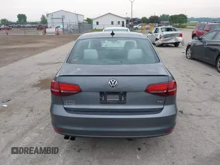 2016 Volkswagen Jetta Sport z VIN 3VWD17AJ8GM292211, wystawiony jako IAAI lot #42371317 z przebiegiem 142 360 mil mil oraz . Historia ofert i sprzedaży dostępna na DreamBid. Obrazek 16.