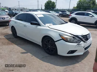 2017 Nissan Altima SV with VIN 1N4AL3AP1HC494166, listed as a IAAI auction lot 42429438 with 121,296 mi miles and . Bid and sale history available at DreamBid. Image 1.