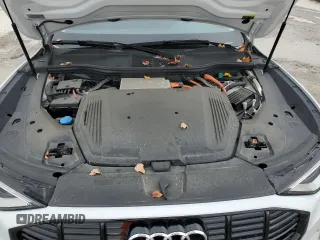 2021 Audi e-tron Premium Plus with VIN WA1LAAGE4MB003487, listed as a Copart auction lot 82790024 with 28,165 mi miles and Salvage title. Bid and sale history available at DreamBid. Image 12.