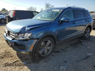 2020 Volkswagen Tiguan SE z VIN 3VV3B7AXXLM150387, wystawiony jako Copart lot #50516415 z przebiegiem 31 419 mil mil oraz Szkody całkowita. Historia ofert i sprzedaży dostępna na DreamBid. Obrazek 1.