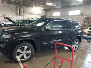 2014 Jeep Grand Cherokee Overland with VIN 1C4RJFCGXEC181159, listed as a IAAI auction lot 41861192 with 111,401 mi miles. Bid and sale history available at carsss.com. Image 14.