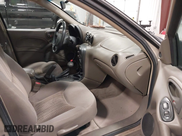 2003 Pontiac Grand Am SE1 with VIN 1G2NF52EX3C104710, listed as a IAAI auction lot 42053621 with 102,012 mi miles. Bid and sale history available at carsss.com. Image 5.