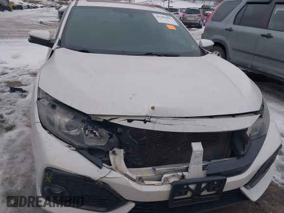 2018 Honda Civic Si with VIN 2HGFC1E50JH706377, listed as a IAAI auction lot 41384413 with 76,115 mi miles and . Bid and sale history available at DreamBid. Image 6.