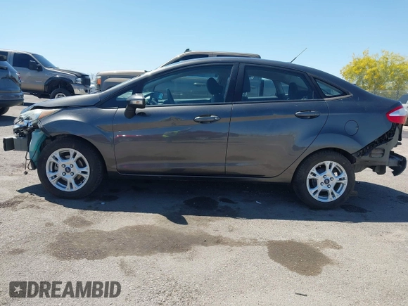2015 Ford Fiesta SE with VIN 3FADP4BJ1FM217045, listed as a IAAI auction lot 42120444 with 119,207 mi miles and . Bid and sale history available at DreamBid. Image 15.