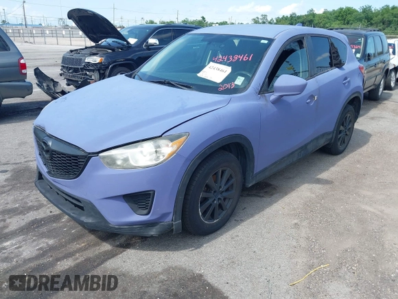 2013 Mazda CX-5 Sport with VIN JM3KE2BE8D0160381, listed as a IAAI auction lot 42438461 with 213,354 mi miles and . Bid and sale history available at DreamBid. Image 2.