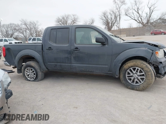 2014 Nissan Frontier SV with VIN 1N6AD0EV9EN726119, listed as a IAAI auction lot 41349641 with 139,652 mi miles and . Bid and sale history available at DreamBid. Image 13.