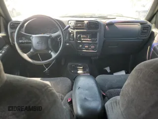 1999 Chevrolet Blazer Trailblazer z VIN 1GNDT13W1X2169254, wystawiony jako Copart lot #55021105 z przebiegiem 158 169 mil mil oraz Szkody całkowita. Historia ofert i sprzedaży dostępna na DreamBid. Obrazek 8.
