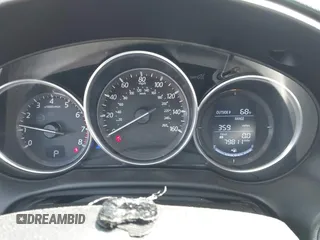 2016 Mazda CX-5 Grand Touring with VIN JM3KE4DY9G0893174, listed as a IAAI auction lot 41887814 with 79,811 mi miles. Bid and sale history available at carsss.com. Image 7.