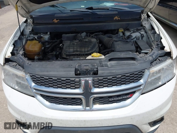 2017 Dodge Journey SXT z VIN 3C4PDCBG4HT590992, wystawiony jako IAAI lot #42378549 z przebiegiem 275 884 mil mil oraz . Historia ofert i sprzedaży dostępna na DreamBid. Obrazek 10.