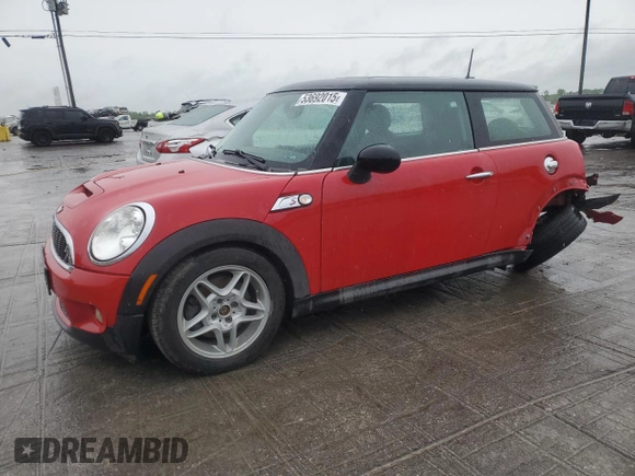 2010 MINI Hardtop S with VIN WMWMF7C50ATZ68936, listed as a Copart auction lot 53692015 with 122,195 mi miles and Salvage Title. Bid and sale history available at DreamBid. Image 1.