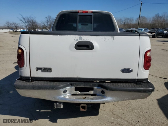 2002 Ford F-150 XLT with VIN 1FTRW07L12KA10596, listed as a Copart auction lot 46506185 with 0 mi miles and Salvage Title. Bid and sale history available at carsss.com. Image 6.
