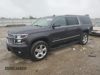 2016 Chevrolet Suburban LT with VIN 1GNSKHKC3GR366637, listed as a Copart auction lot 59148575 with 221,505 mi miles and Salvage title. Bid and sale history available at DreamBid. Image 1.
