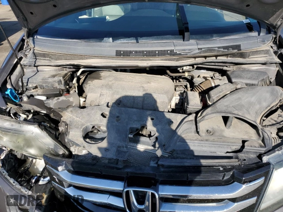 2016 Honda Odyssey Touring Elite with VIN 5FNRL5H91GB092214, listed as a Copart auction lot 61158745 with 121,477 mi miles and Salvage title. Bid and sale history available at DreamBid. Image 12.