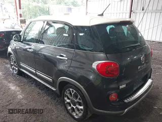 2014 FIAT 500L Trekking with VIN ZFBCFADH6EZ017800, listed as a IAAI auction lot 42572995 with 99,646 mi miles and . Bid and sale history available at DreamBid. Image 3.
