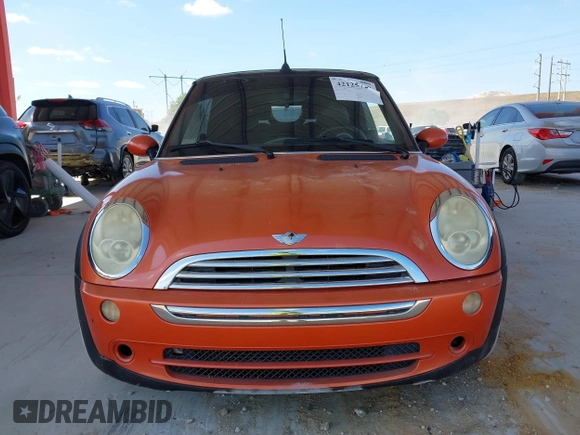 2005 MINI Convertible with VIN WMWRF334X5TF61026, listed as a IAAI auction lot 42125720 with 117,908 mi miles and . Bid and sale history available at DreamBid. Image 13.