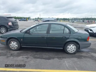 1998 Saturn SL с VIN 1G8ZH5280WZ295857, выставлен на аукционе IAAI как лот 42238789 с пробегом 153 163 миль миль и . История ставок и продаж доступна на DreamBid. Изображение 14.