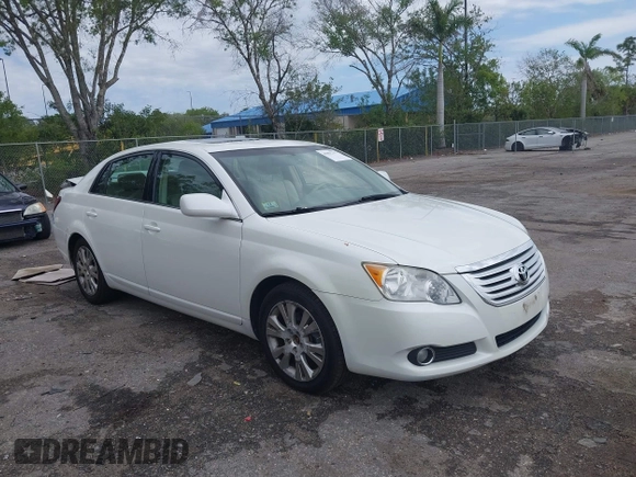 2010 Toyota Avalon XL with VIN 4T1BK3DB8AU354533, listed as a IAAI auction lot 41802797 with 117,956 mi miles and . Bid and sale history available at carsss.com. Image 1.