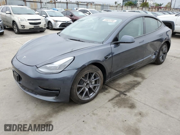 2023 Tesla Model 3 with VIN 5YJ3E1EA3PF697049, listed as a Copart auction lot 55601295 with 12,373 mi miles and Salvage Title. Bid and sale history available at DreamBid. Image 1.