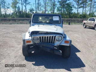 2006 Jeep Wrangler X with VIN 1J4FA39S86P743660, listed as a IAAI auction lot 41890339 with 198,099 mi miles and . Bid and sale history available at DreamBid. Image 12.