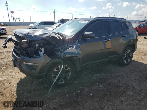 2018 Jeep Compass Trailhawk with VIN 3C4NJDDB0JT458339, listed as a Copart auction lot 58834155 with 103,811 mi miles and Salvage title. Bid and sale history available at DreamBid. Image 1.